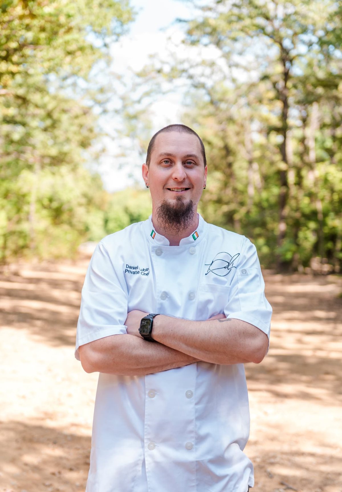 Daniel Lubin in his own branded chef whites, name and signature embroidered on the jacket.